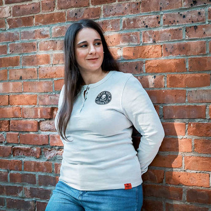 A model wearing the Death Wish Coffee Rolling Bones Women's Waffle Knit.