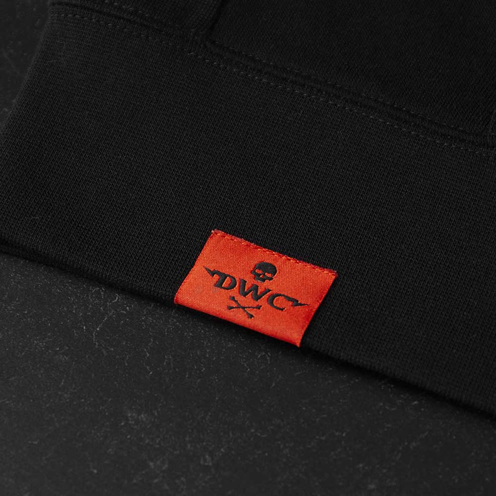 The woven tag on the Death Wish Coffee Signature Zip Hoodie.