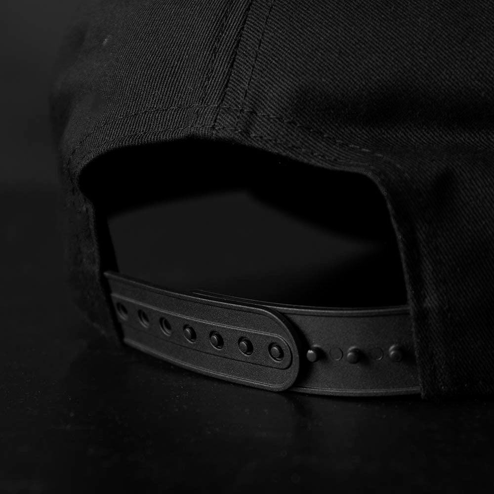 The back of the Death Wish Coffee Black Rebellious By Nature Snapback.