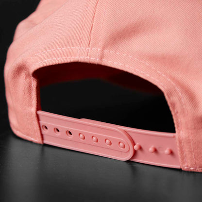 The back of the Death Wish Coffee Pink Rebellious By Nature Snapback.