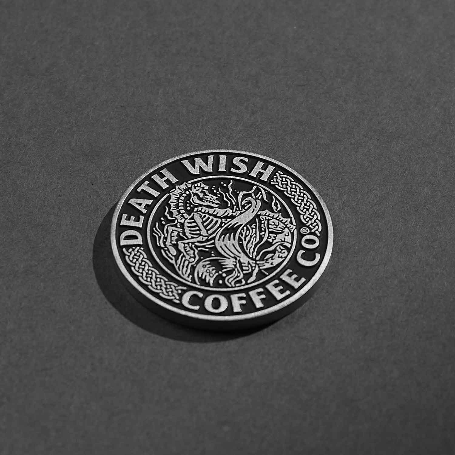 A side angle view of the Death Wish Coffee Heads or Horses’ Tails Commemorative Coin.