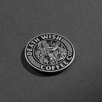 A side angle view of the Death Wish Coffee Heads or Horses’ Tails Commemorative Coin.
