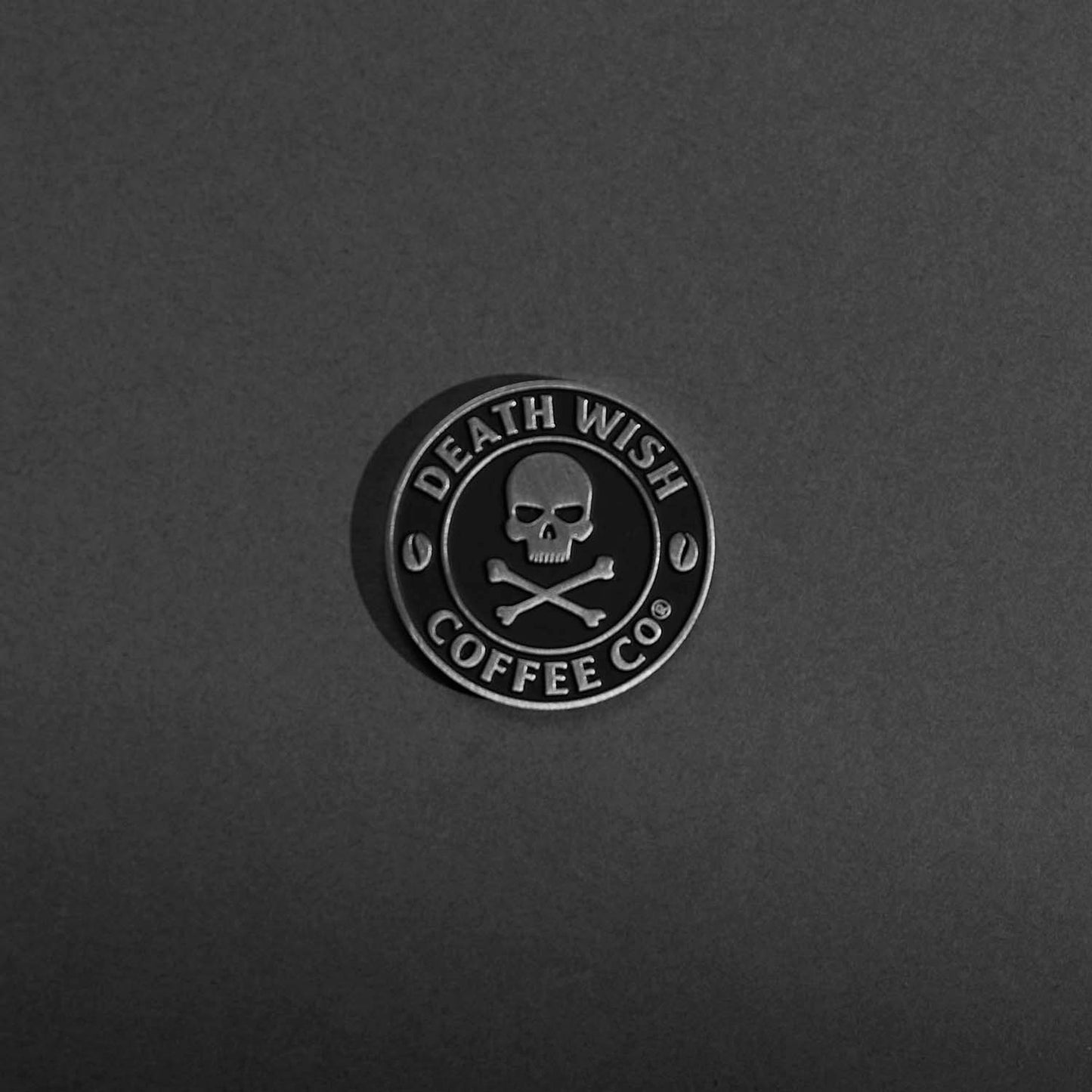 The Death Wish Coffee logo side of the Death Wish Coffee Heads or Horses’ Tails Commemorative Coin.