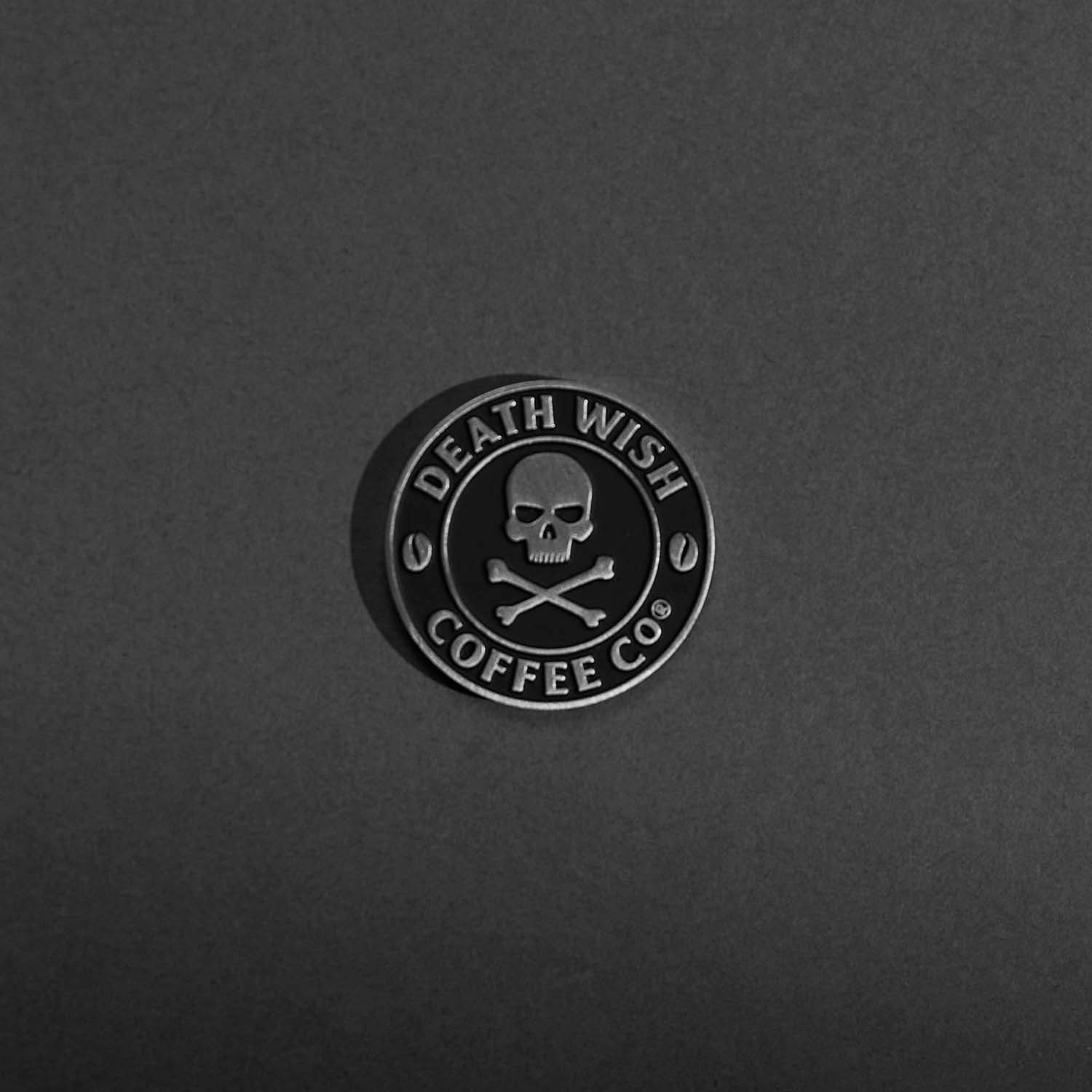 The Death Wish Coffee logo side of the Death Wish Coffee Heads or Horses’ Tails Commemorative Coin.