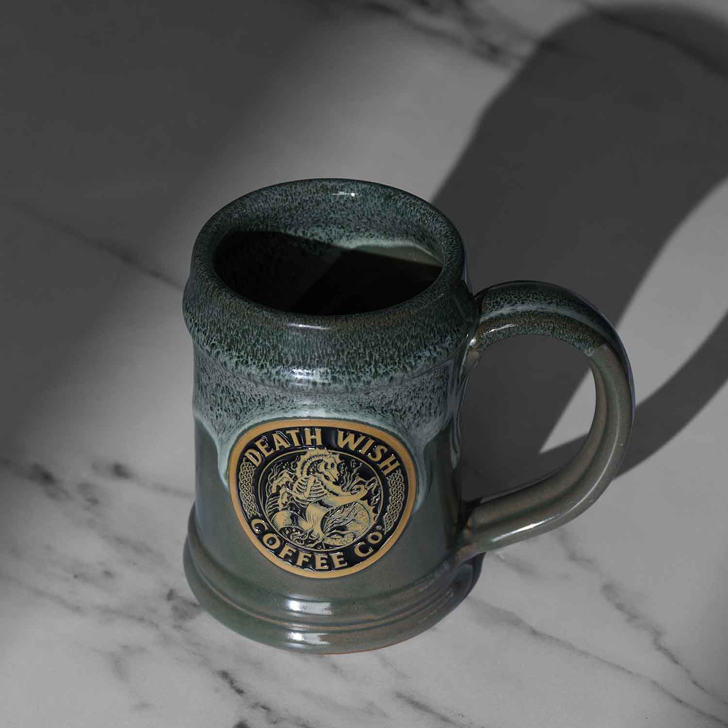 A top down view of the Death Wish Coffee Cursed Waters Kelpie Tankard.