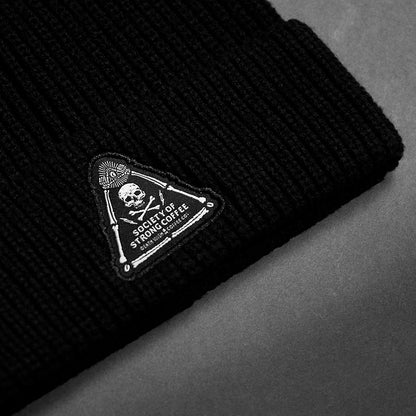 A close up of the front of the Death Wish Coffee Society Insignia Beanie.