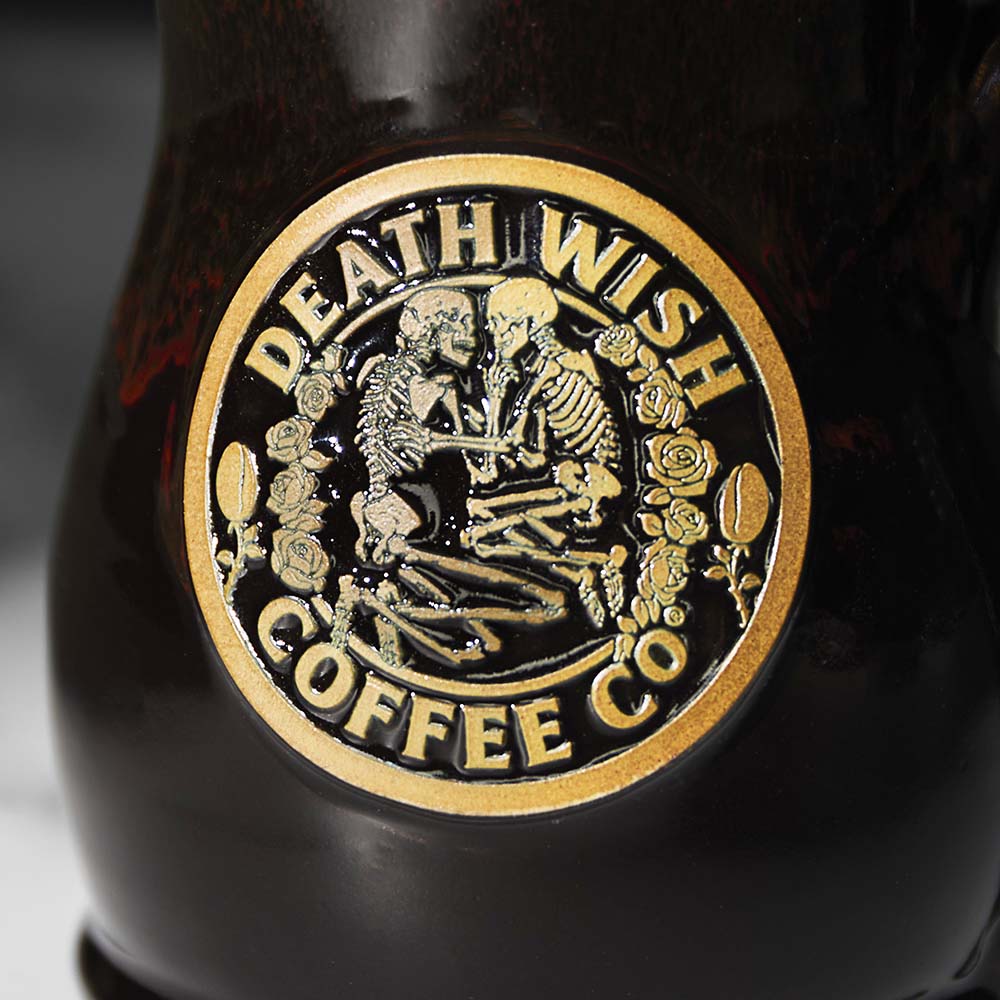 A close up of the Death Wish Coffee Eternal Embrace Resurrected Relic Mug.