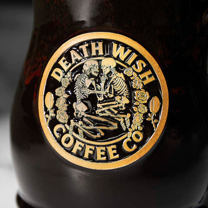 A close up of the Death Wish Coffee Eternal Embrace Resurrected Relic Mug.