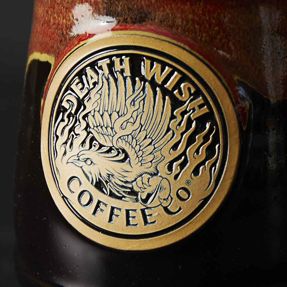 The medallion detail of the Death Wish Coffee Phoenix Mug.