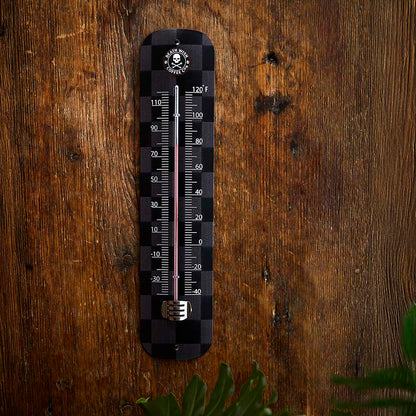 The Death Wish Coffee Boiling Point Wall Thermometer on a wall.