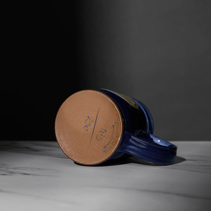 The bottom of the blue Death Wish Coffee Declaration of Caffeination Mystery Mug.