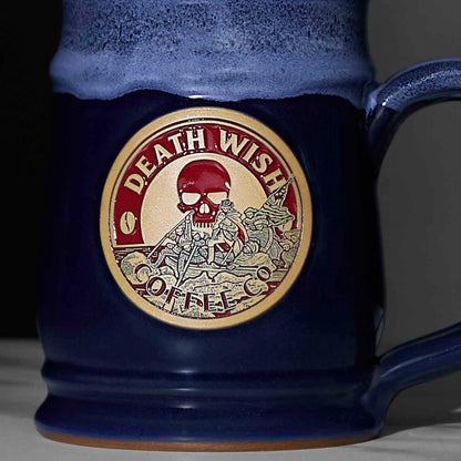 A close up of the blue Death Wish Coffee Declaration of Caffeination Mystery Mug.