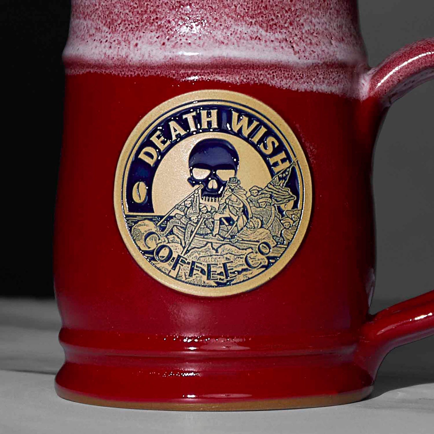 A close up of the red Death Wish Coffee Declaration of Caffeination Mystery Mug.