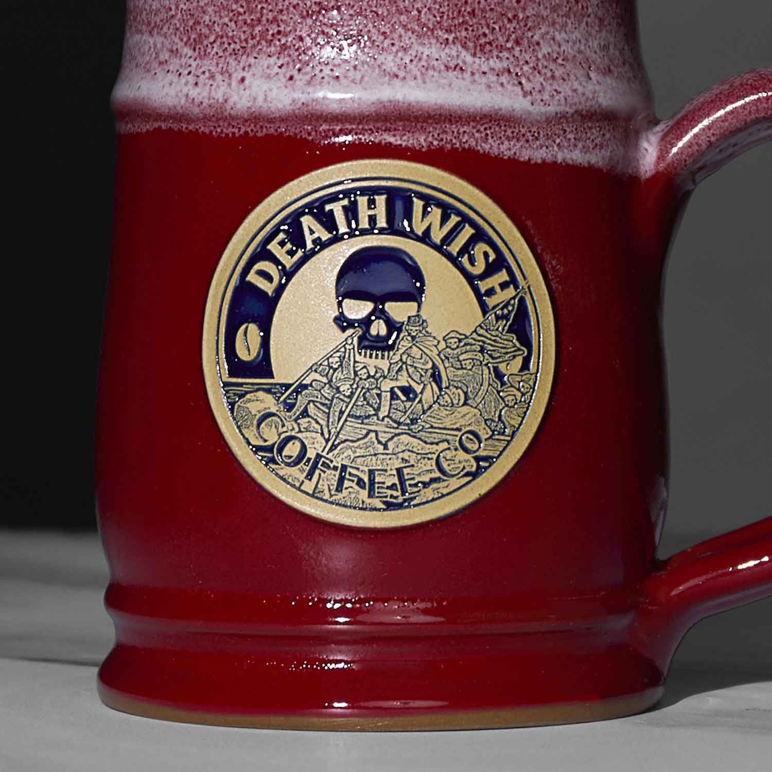 A close up of the red Death Wish Coffee Declaration of Caffeination Mystery Mug.