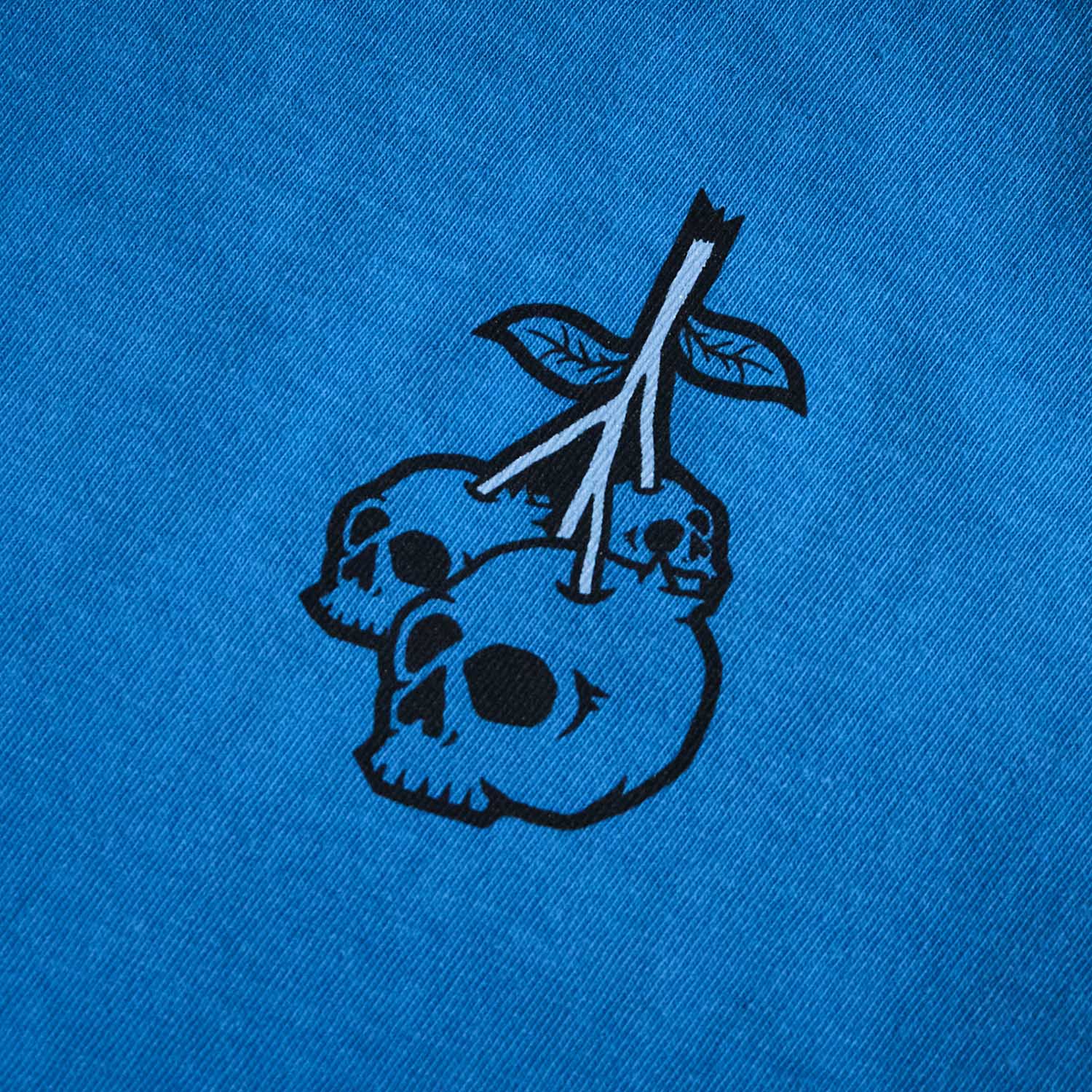 Up close of the front of the Death Wish Coffee Bury Your Blues Tee.