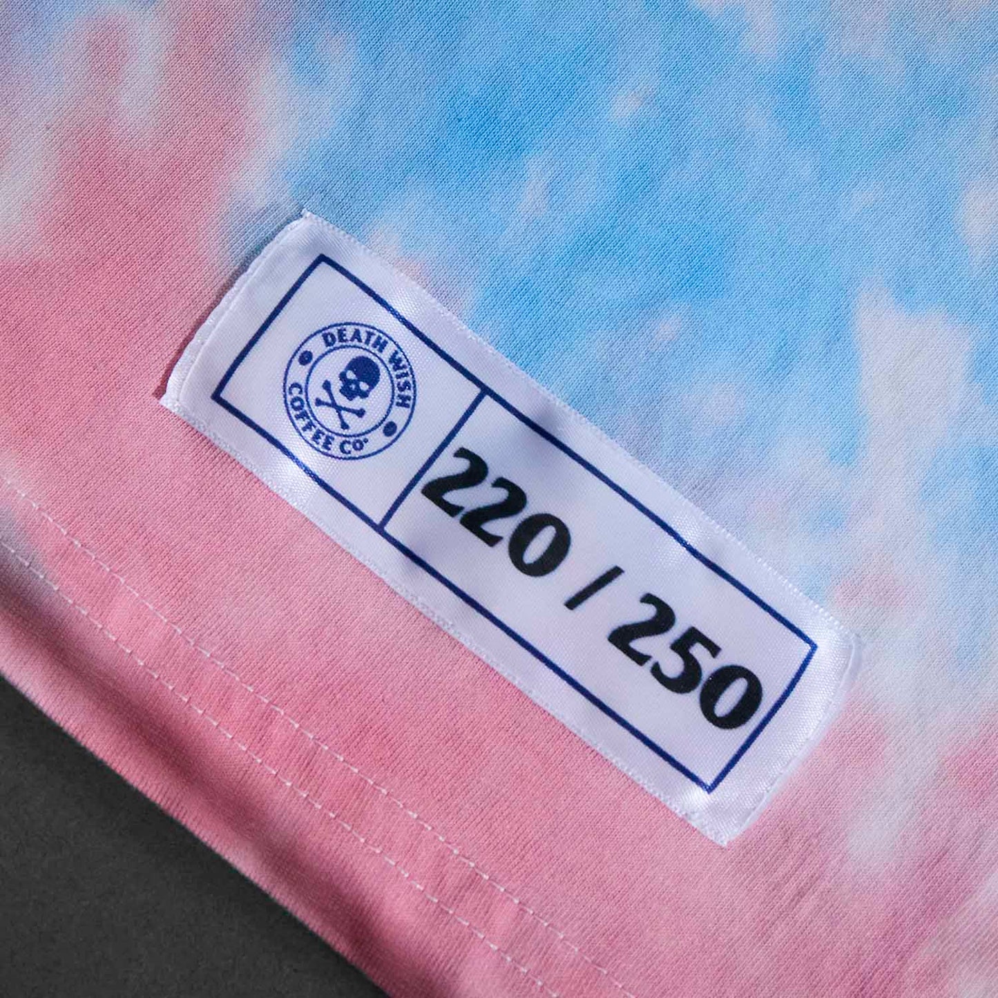 A detail photo of the numbered woven tag of the Death Wish Coffee All-American Tank.