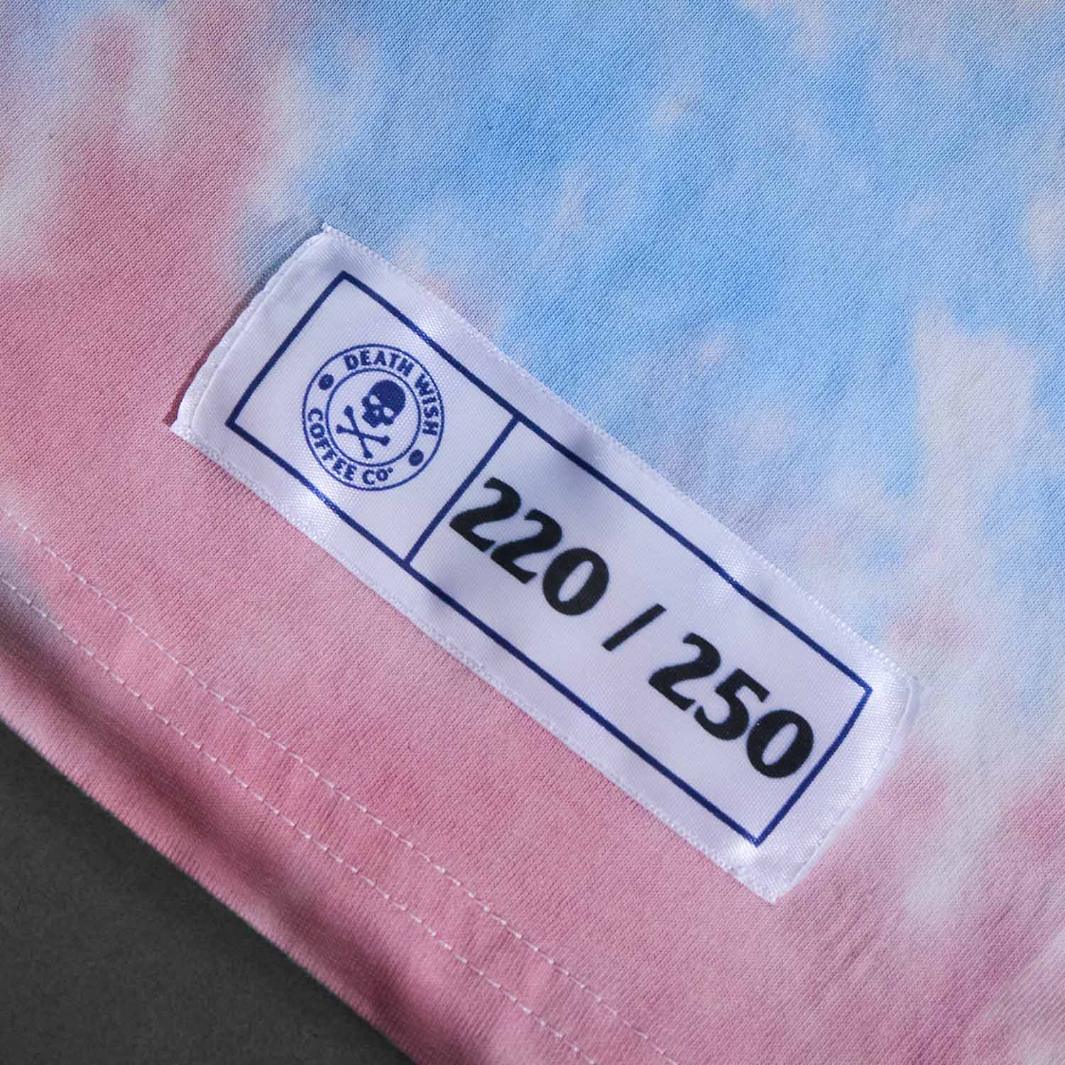A detail photo of the numbered woven tag of the Death Wish Coffee All-American Tank.