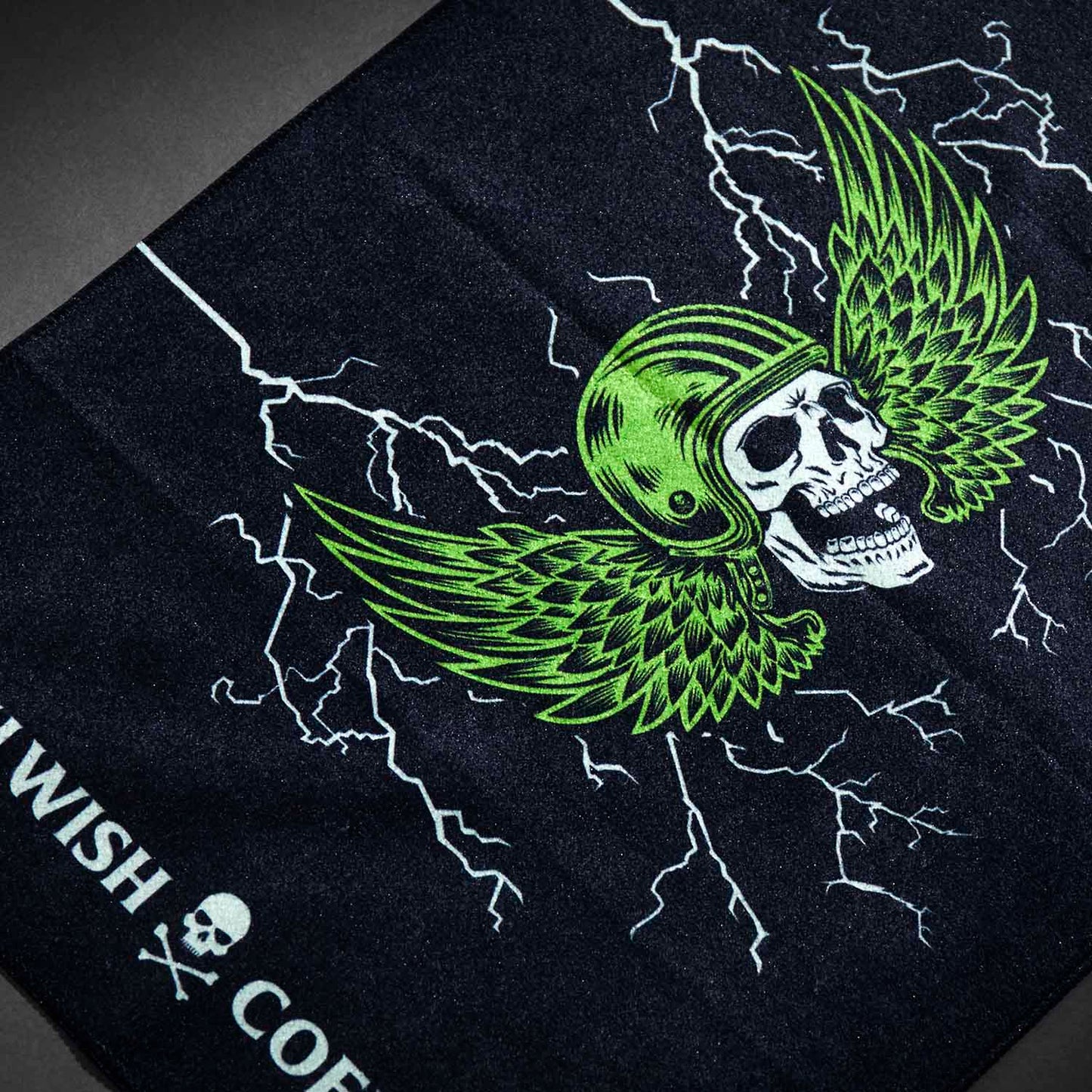 A detail shot of the Death Wish Coffee Blood, Sweat And Coffee Gym Towel.
