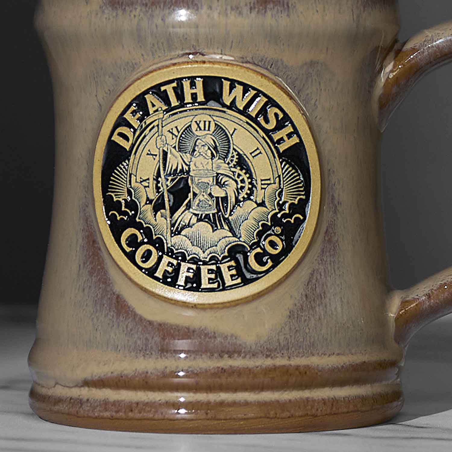 A detail shot of the front of the Death Wish Coffee Father Time Mug.
