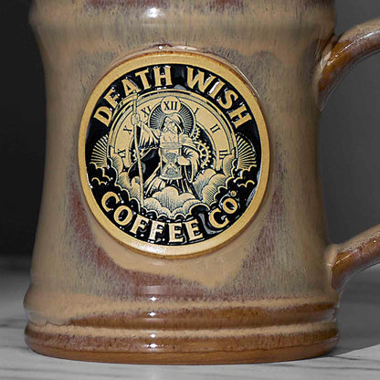 A detail shot of the front of the Death Wish Coffee Father Time Mug.