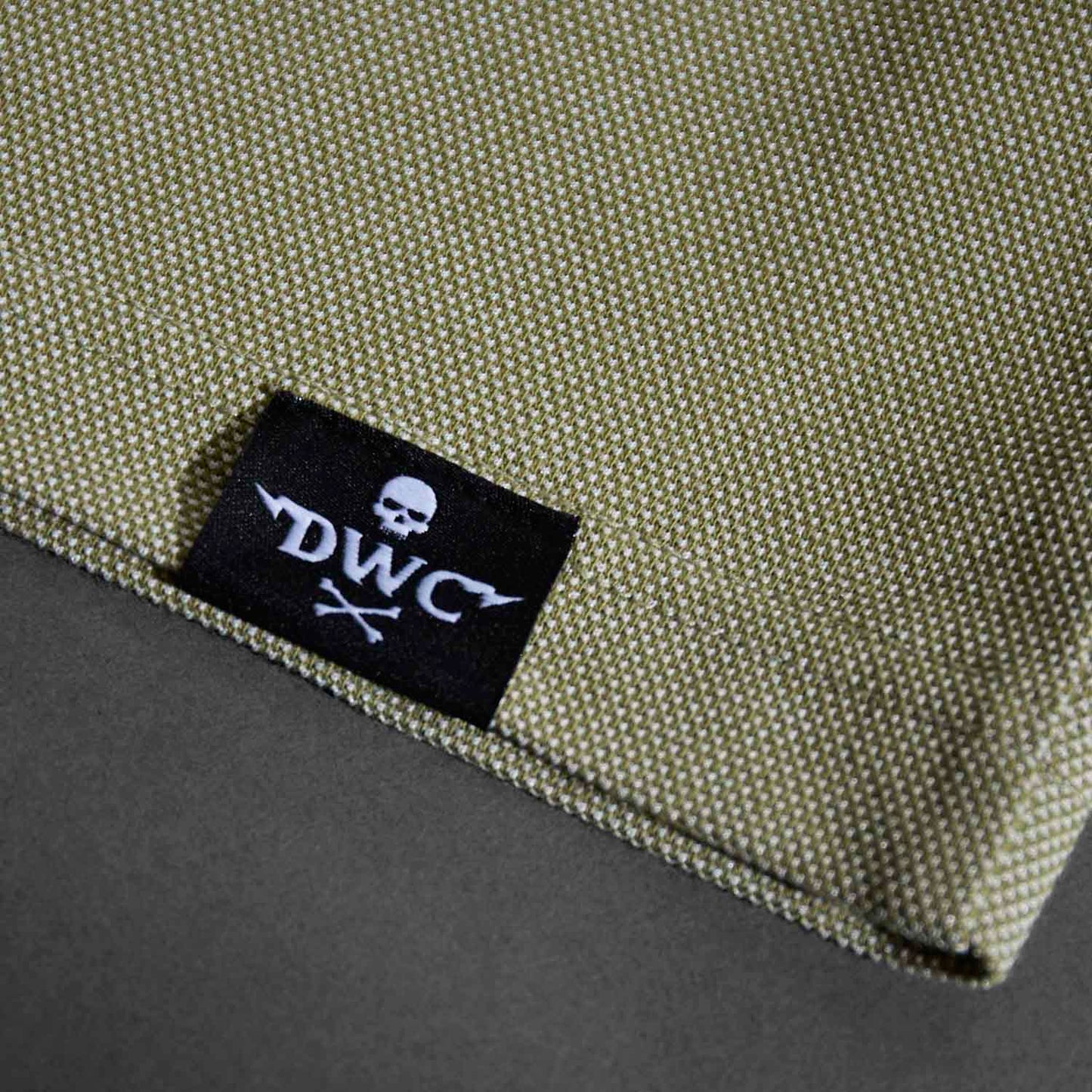 The woven label of the Death Wish Coffee Par For The Course Polo.