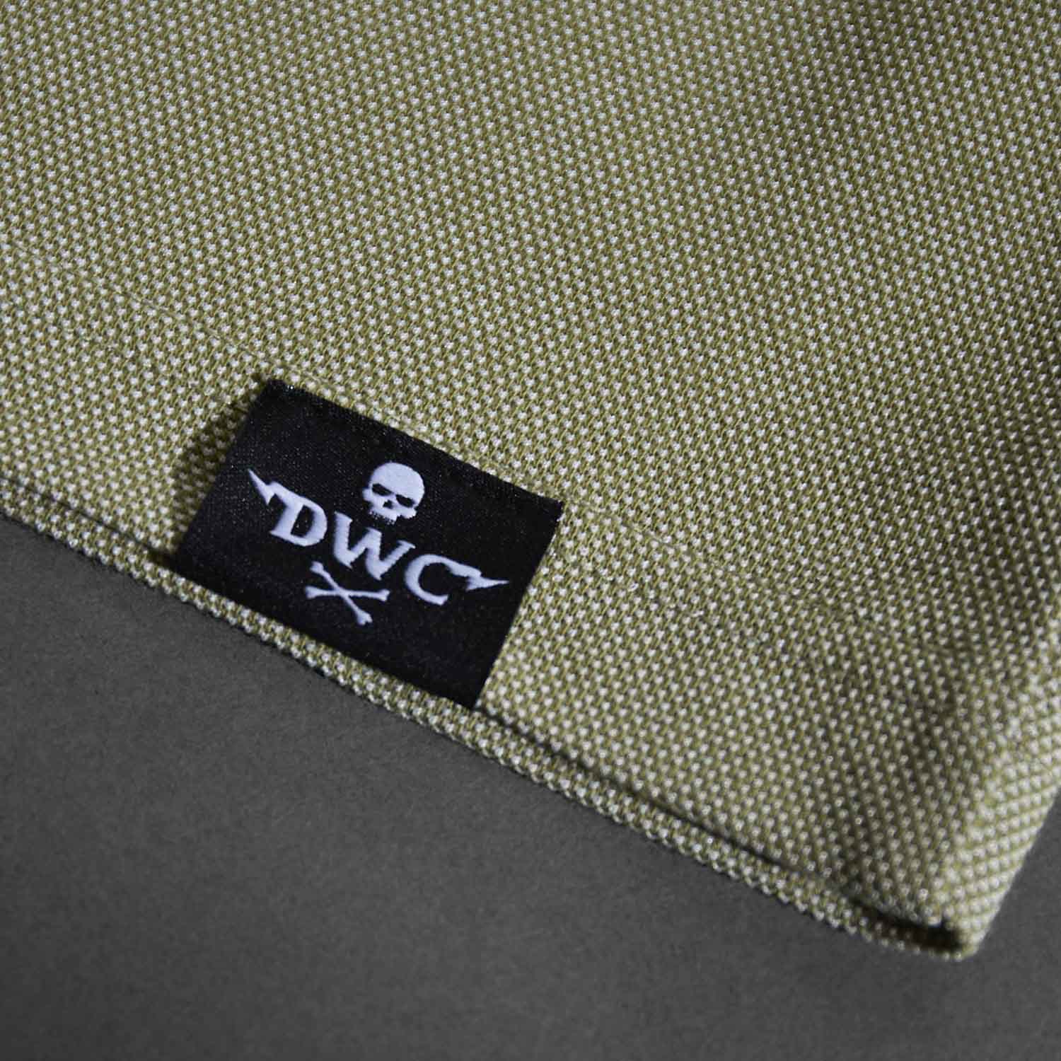 The woven label of the Death Wish Coffee Par For The Course Polo.