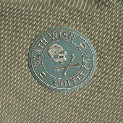 A detail shot of the front of the Death Wish Coffee Par For The Course Polo.