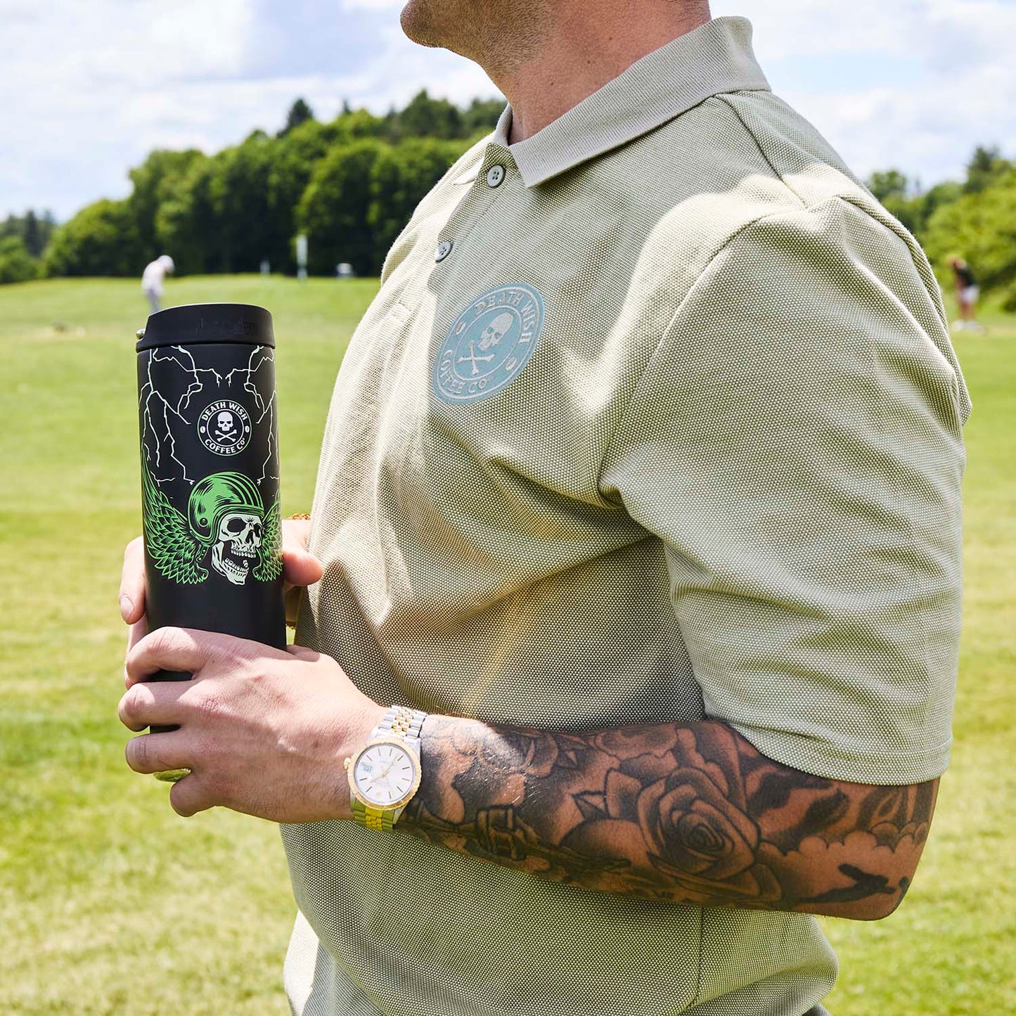 Drinking Power Surge Coffee while wearing the Death Wish Coffee Par For The Course Polo.