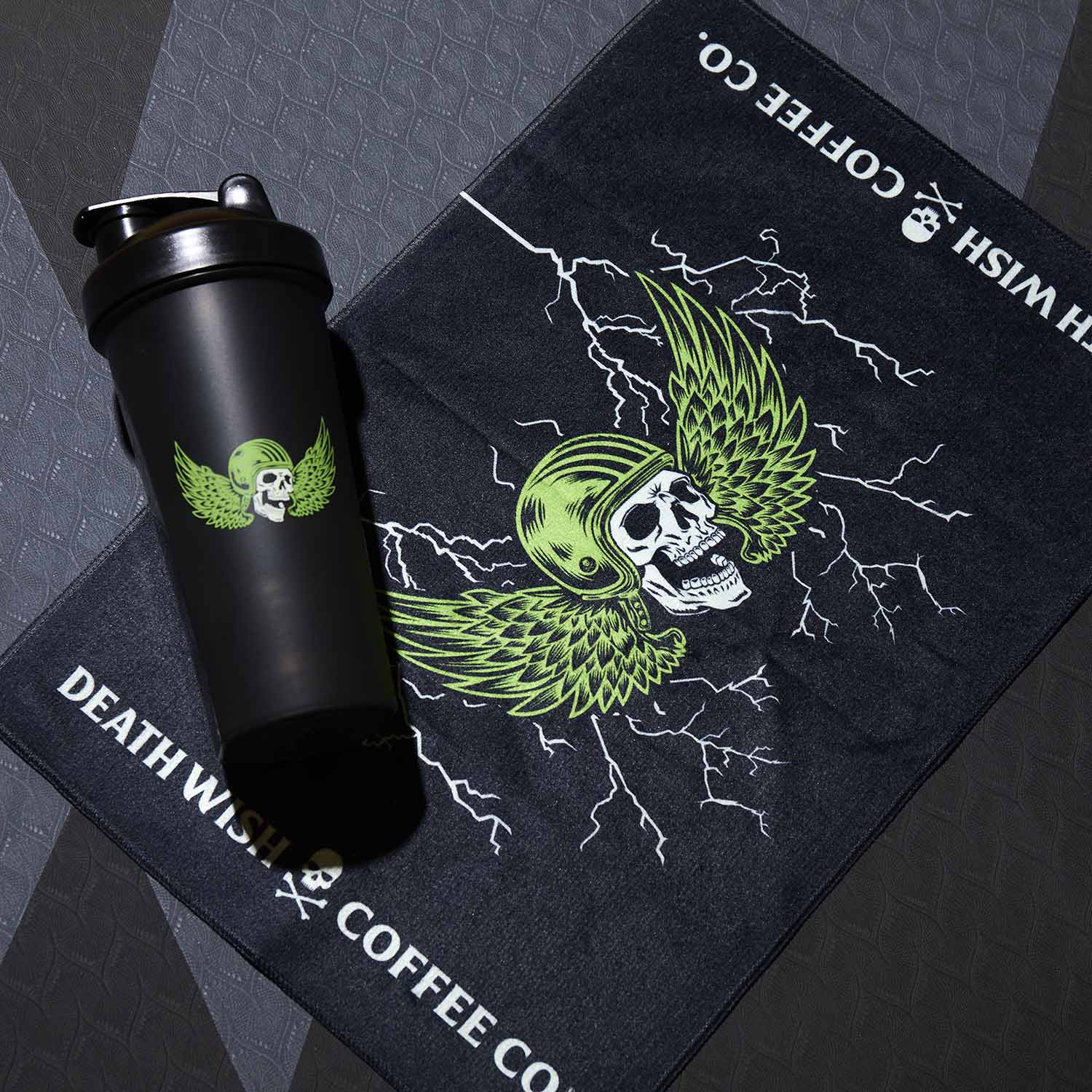 The Death Wish Coffee Blood, Sweat And Coffee Gym Towel next to the matching Shaker Bottle.