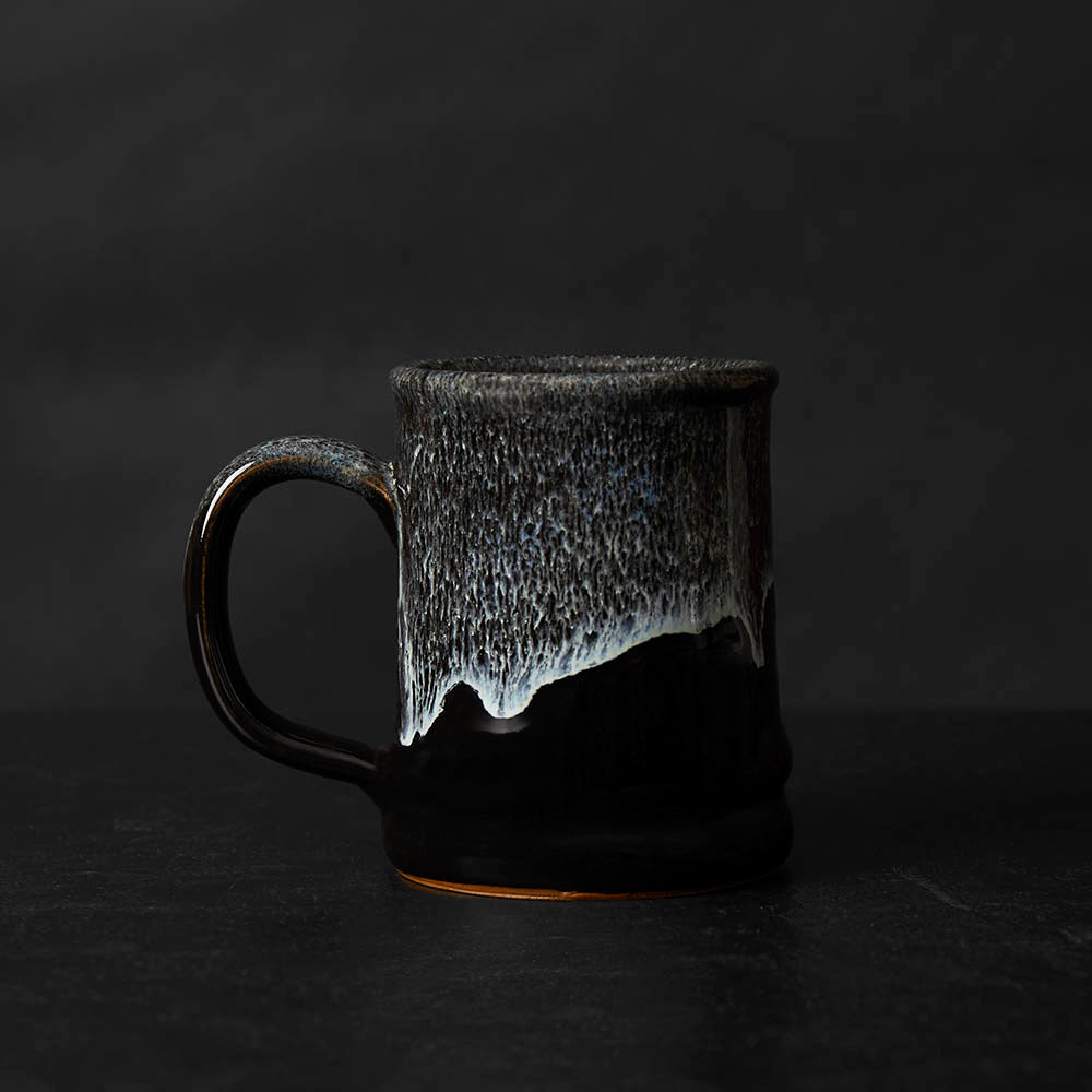 The back of the Rosie the Riveter Resurrected Relic Mug.