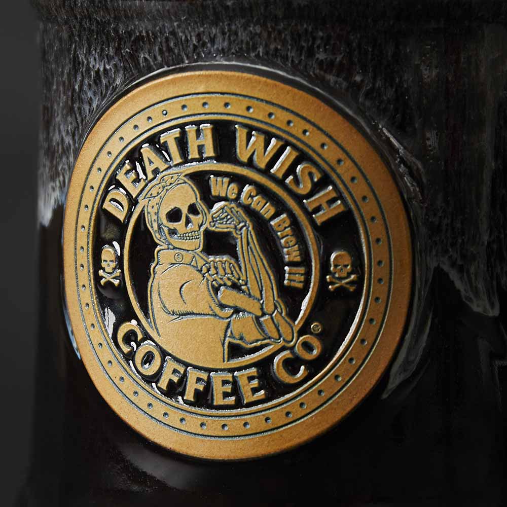 A close up of the front of the Rosie the Riveter Resurrected Relic Mug.
