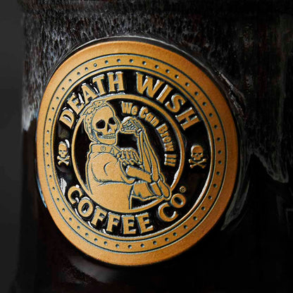 A close up of the front of the Rosie the Riveter Resurrected Relic Mug.