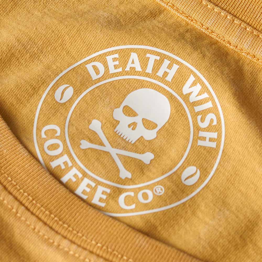 The inner neck label of the Death Wish Coffee Circle of Life Cropped Tee.