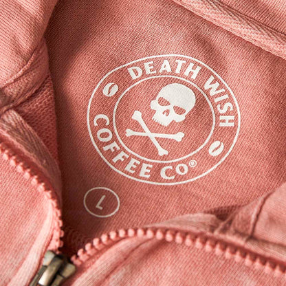 The inner neck label of the Death Wish Coffee Pink Haze Cropped Half Zip.