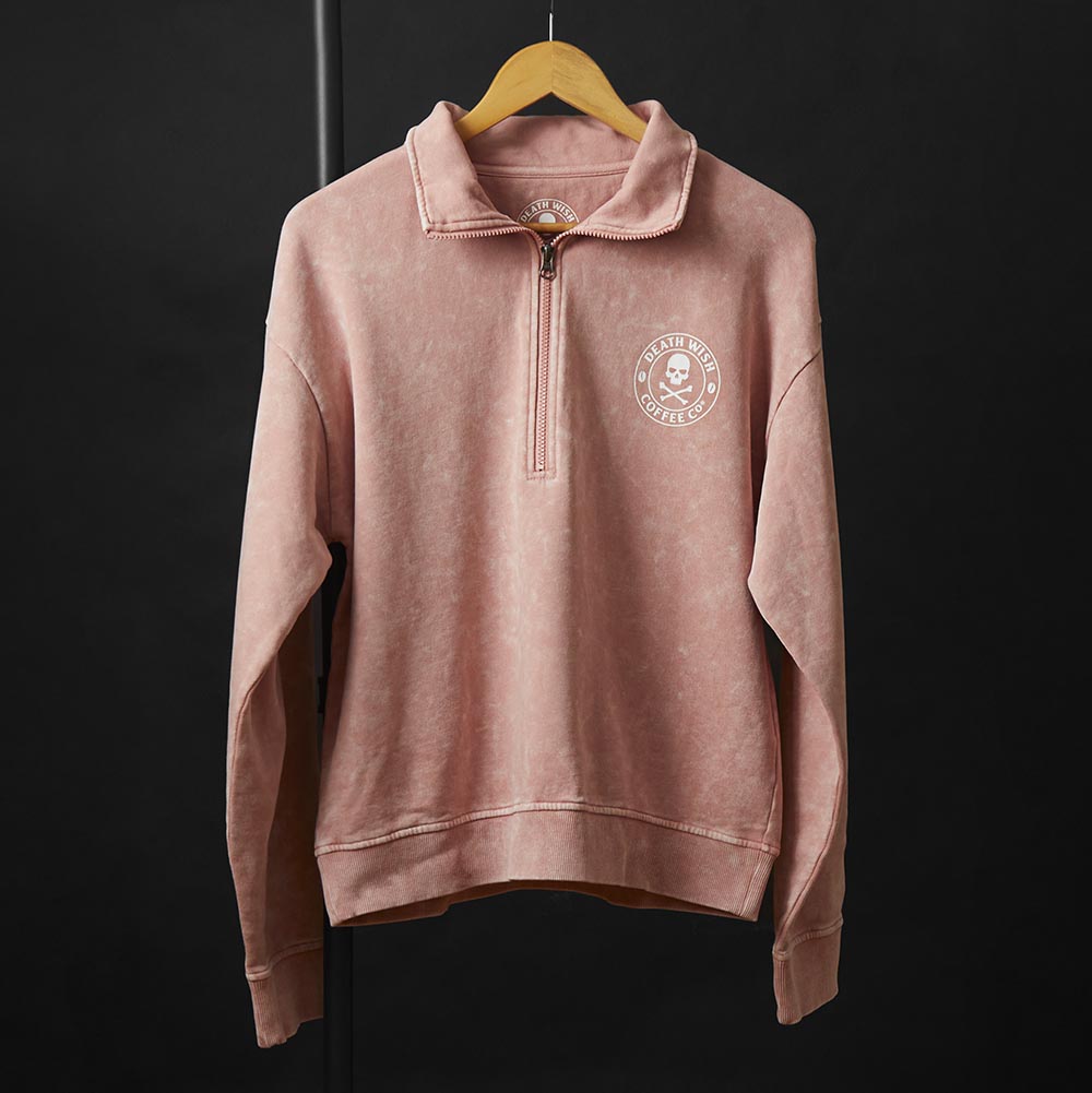 The front of the Death Wish Coffee Pink Haze Cropped Half Zip.