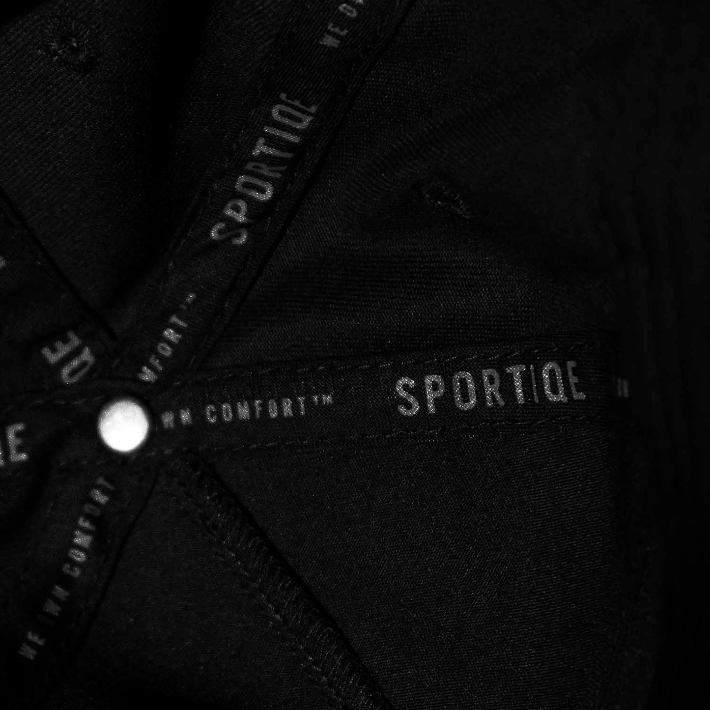 The interior taping of the Death Wish Coffee Graveyard Shift Snapback.