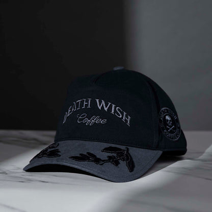 The front of the Death Wish Coffee Graveyard Shift Snapback.