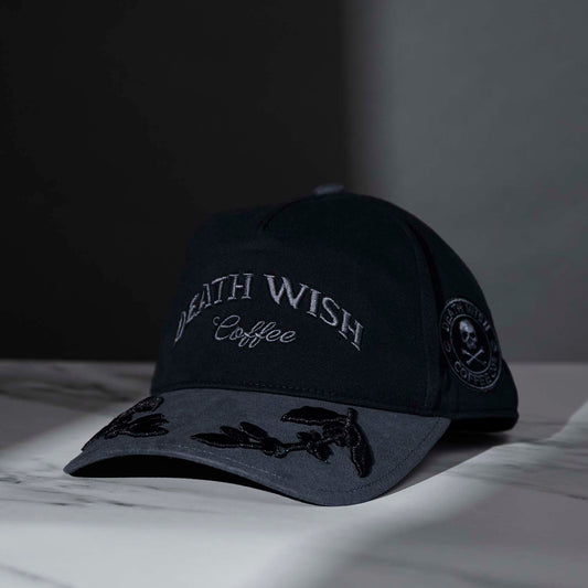 The front of the Death Wish Coffee Graveyard Shift Snapback.