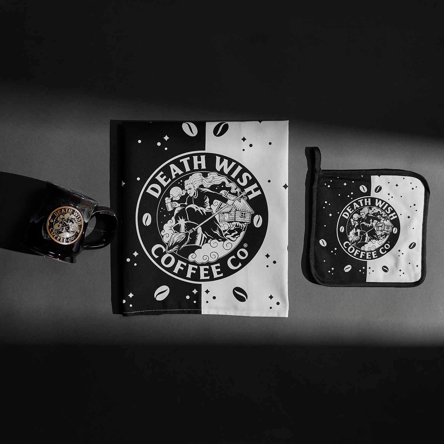 The Death Wish Coffee Baba Yaga Mug and the matching Tea Towel and Potholder Set.
