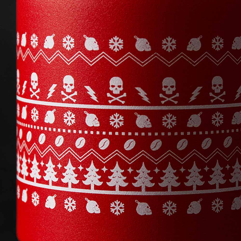 A close up of the sweater inspired mug from the Death Wish Coffee Don't Flake On Me Mug Set.