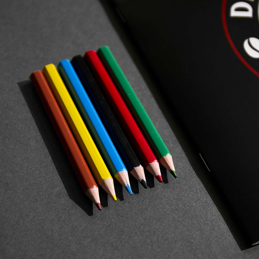 The Death Wish Coffee Medallion Meditations Coloring Book colored pencils.