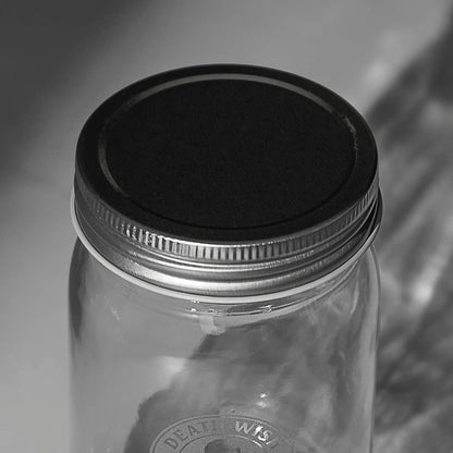 The lid of the Death Wish Coffee Coal Brew Mason Jar Set.