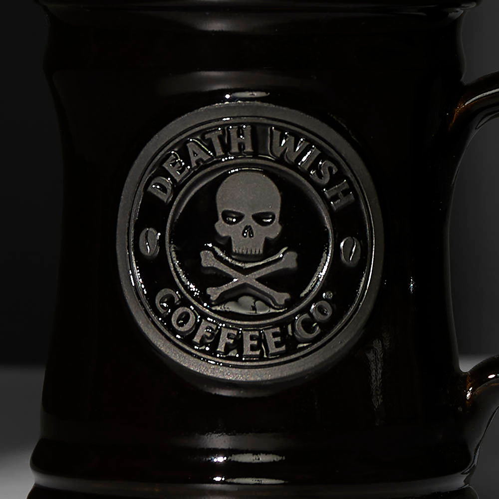 The front of the black Death Wish Coffee Naughty or Nice Mug.