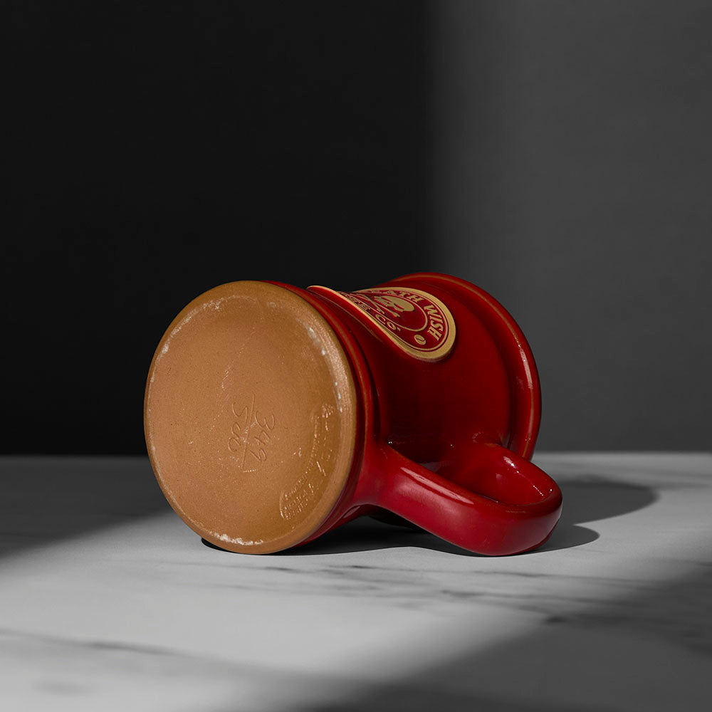 The bottom of the red Death Wish Coffee Naughty or Nice Mug.