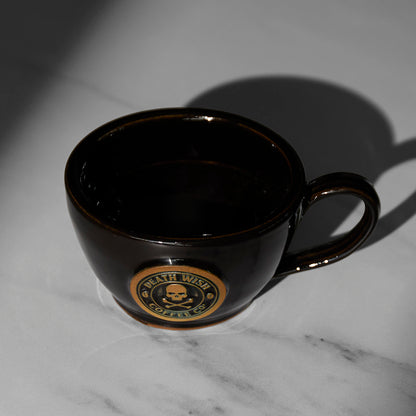 A top down view of the Black Death Wish Coffee Double or Nothing Ceramic Espresso Mug.