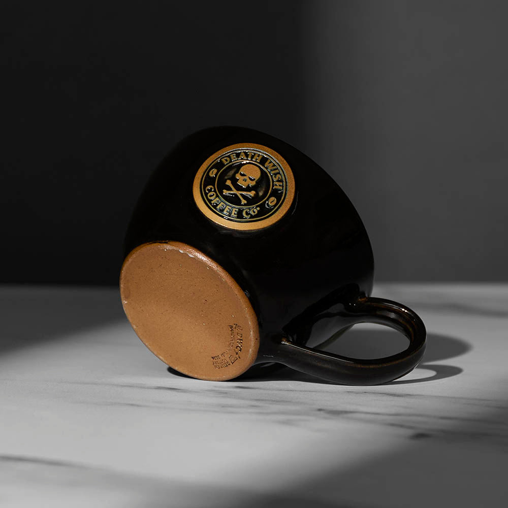 The bottom of the Black Death Wish Coffee Double or Nothing Ceramic Espresso Mug.