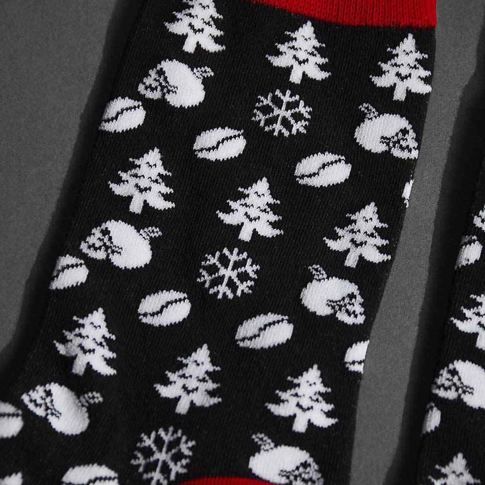A close up of the Death Wish Coffee Skullflake Socks.