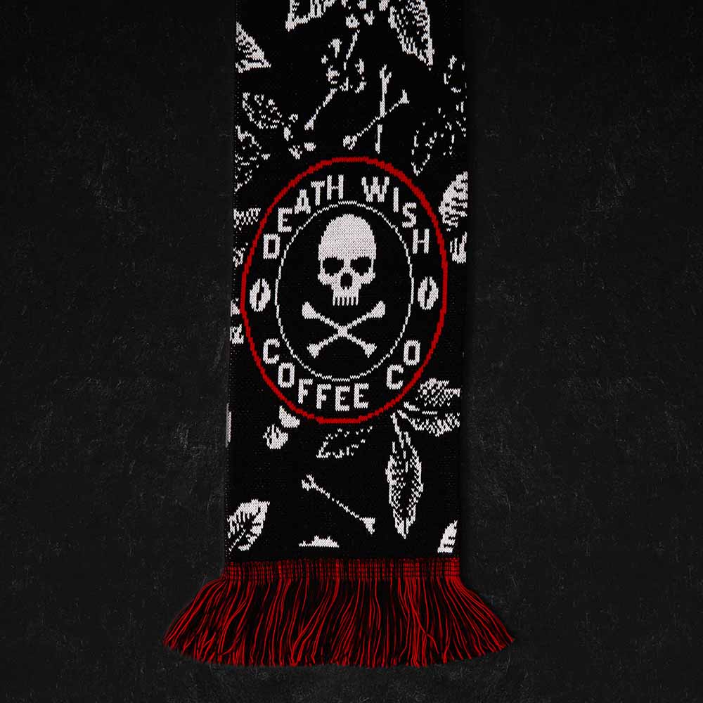 The logo detail of the Death Wish Coffee Sacred Bloom Knit Scarf.