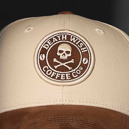 A close up of the front of the Death Wish Coffee Cream and Coffee Snapback.