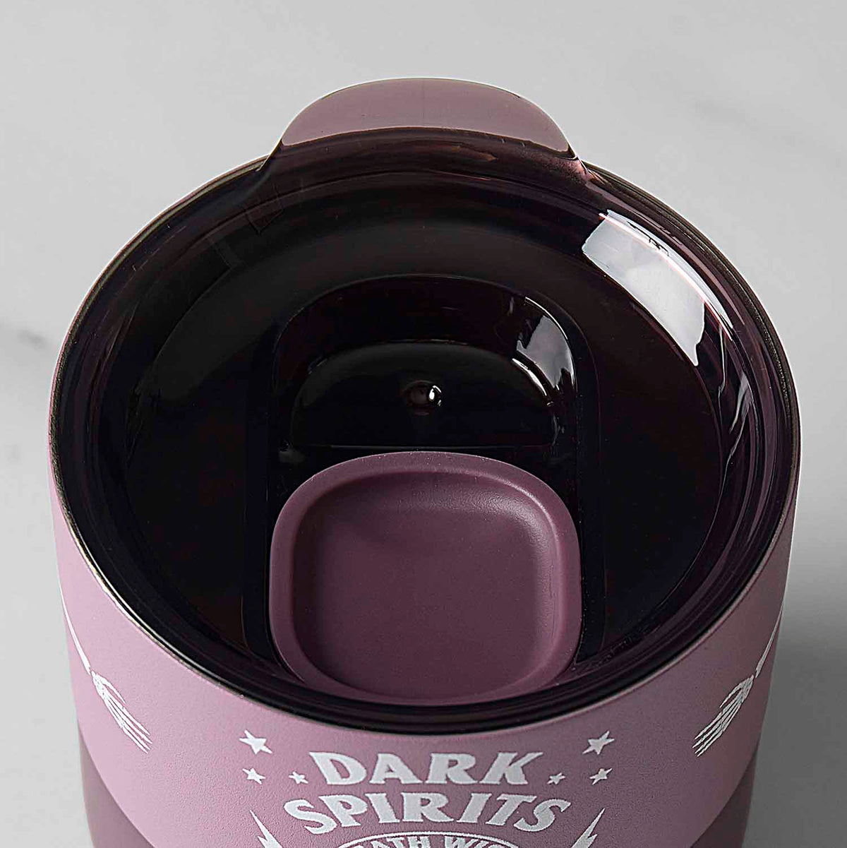 The slide lid of the Death Wish Coffee Dark Spirits 8oz Klean Kanteen.